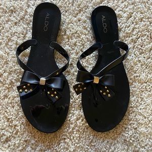Aldo flat sandals with bow.  Size 10.  Color black